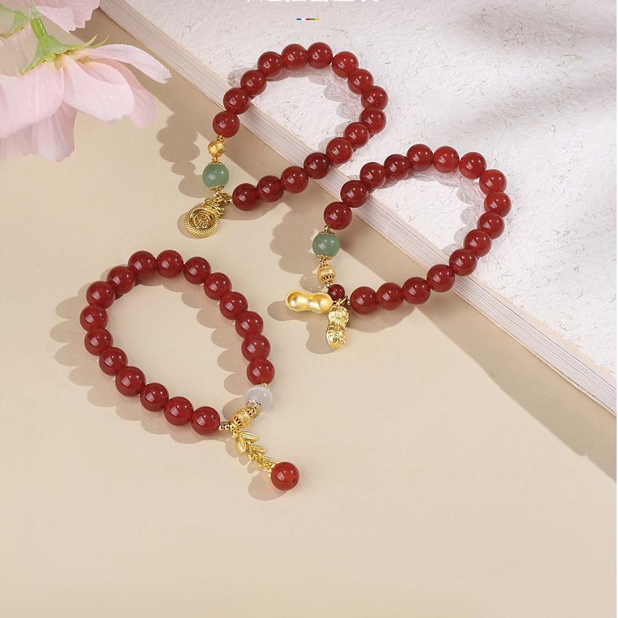 Sacred Morning Blossom Hand-Painted Bracelet in zen setting. Displayed alongside scriptures and ritual items, creating serene atmosphere that highlights its spiritual significance.