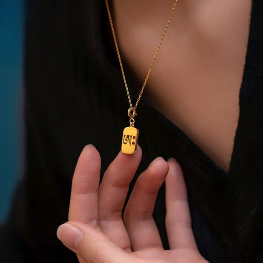 Bespoke silver gilded seed syllable charm, a masterpiece of resonance and Tibetan Buddhist Jewelry Culture.