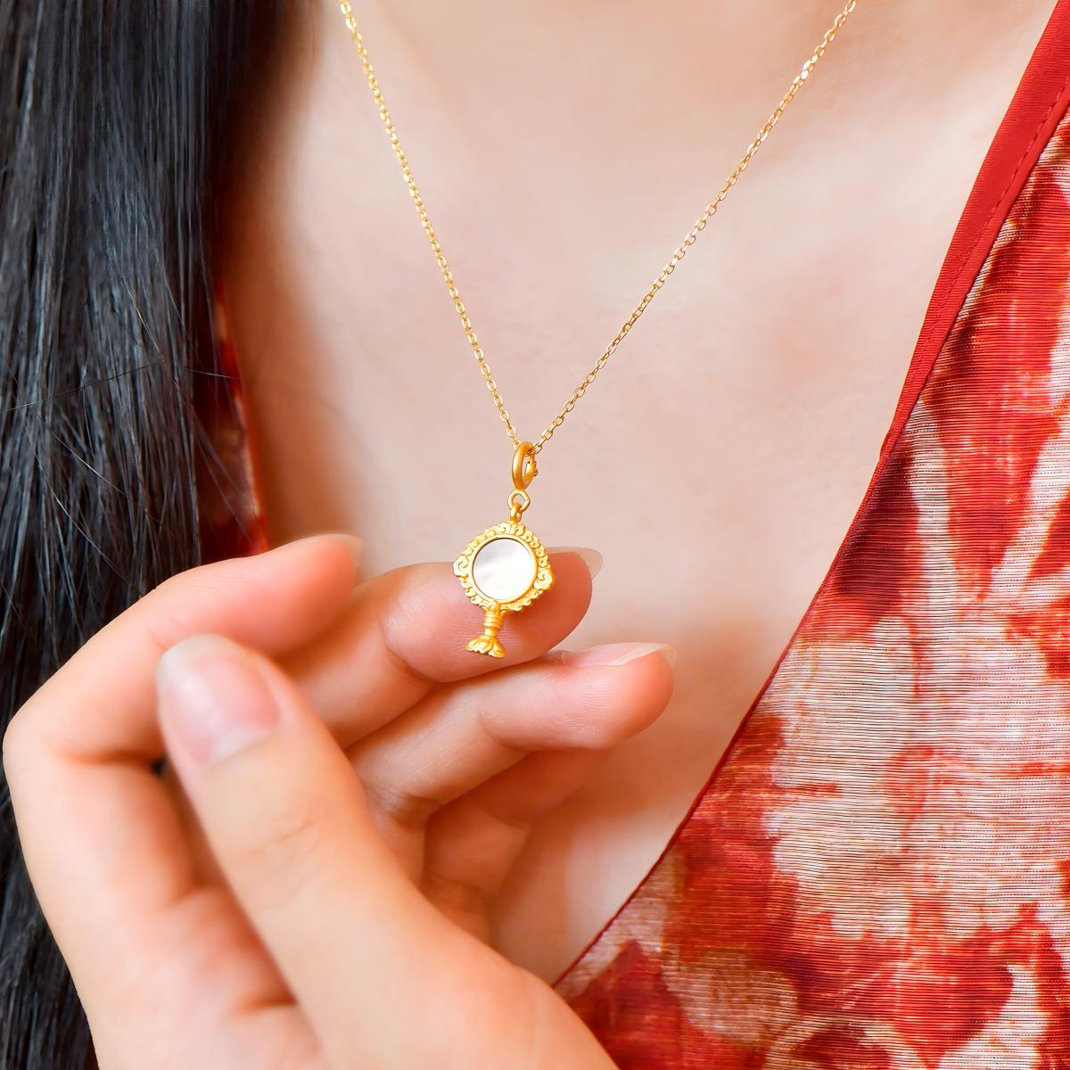 Tibetan Buddhist Jewelry Culture: Hand-carved pure silver pendant representing the Eight Offerings, peak of Buddhist jewelry art and craftsmanship.