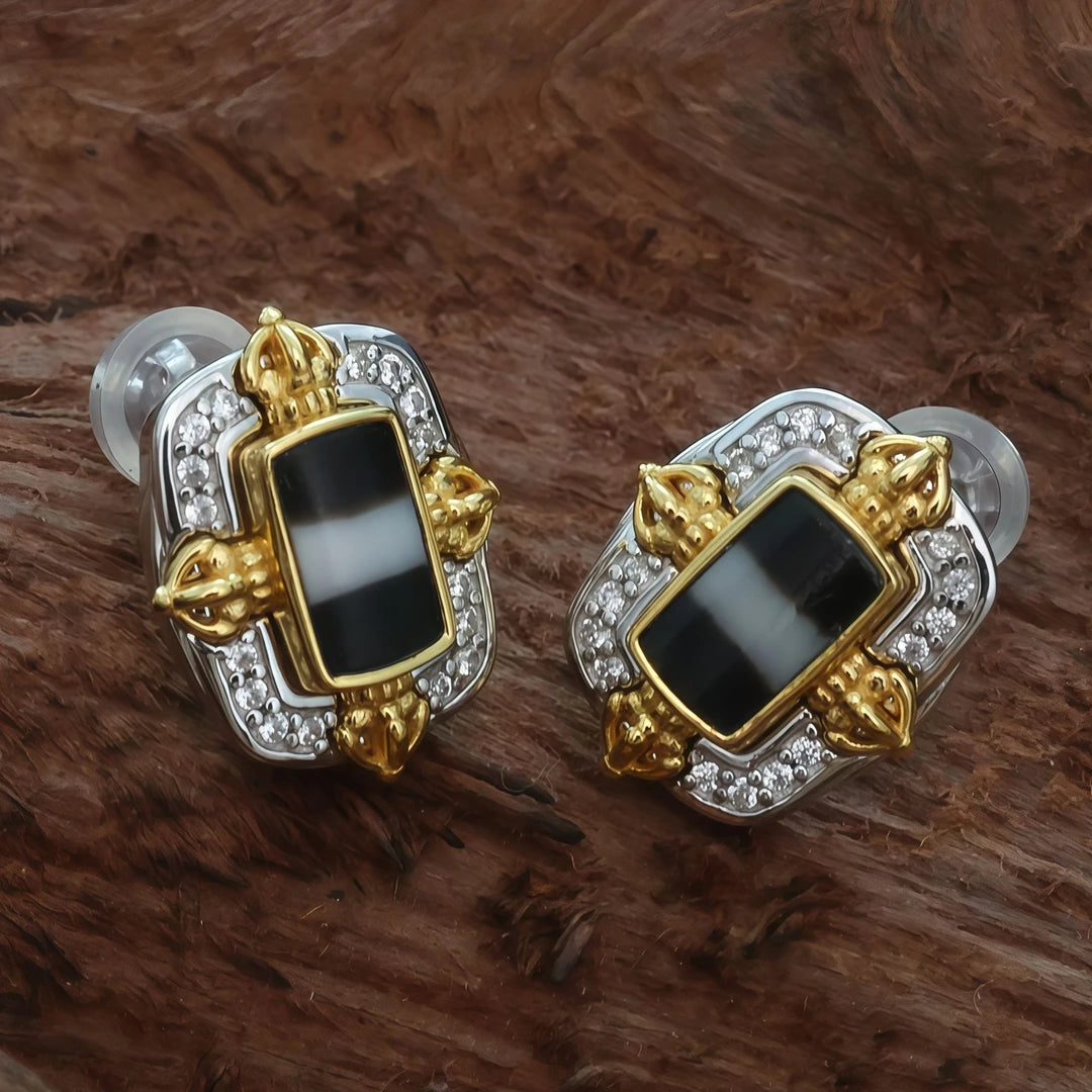 Silver Medicine Buddha Vajra Cross dangle earrings, handmade with Tibetan Buddhist craftsmanship, offering protection, prosperity, and spiritual balance.