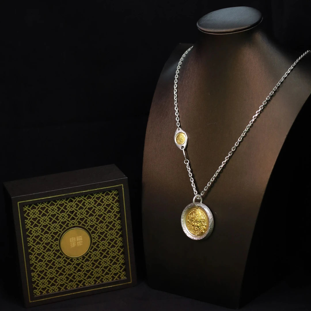 Unique handmade silver Yellow Jambhala pendant showcasing Tibetan Buddhist jewelry culture, finely crafted jewelry art, a meaningful piece for collectors or daily wear.