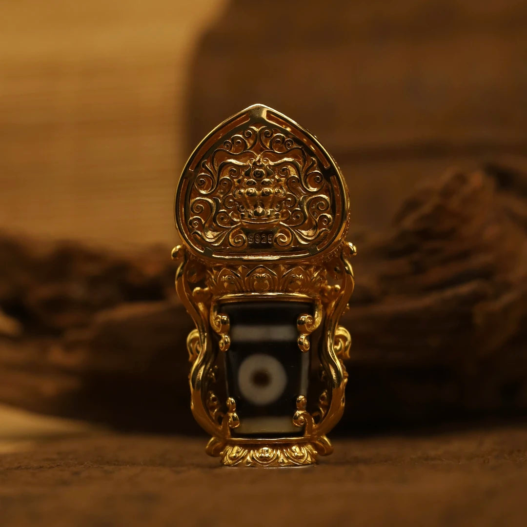 Unique handmade silver zircon Medicine Buddha pendant with detailed carving, showcasing Tibetan Buddhist jewelry culture and artisan jewelry art, perfect for daily wear or spiritual practice.