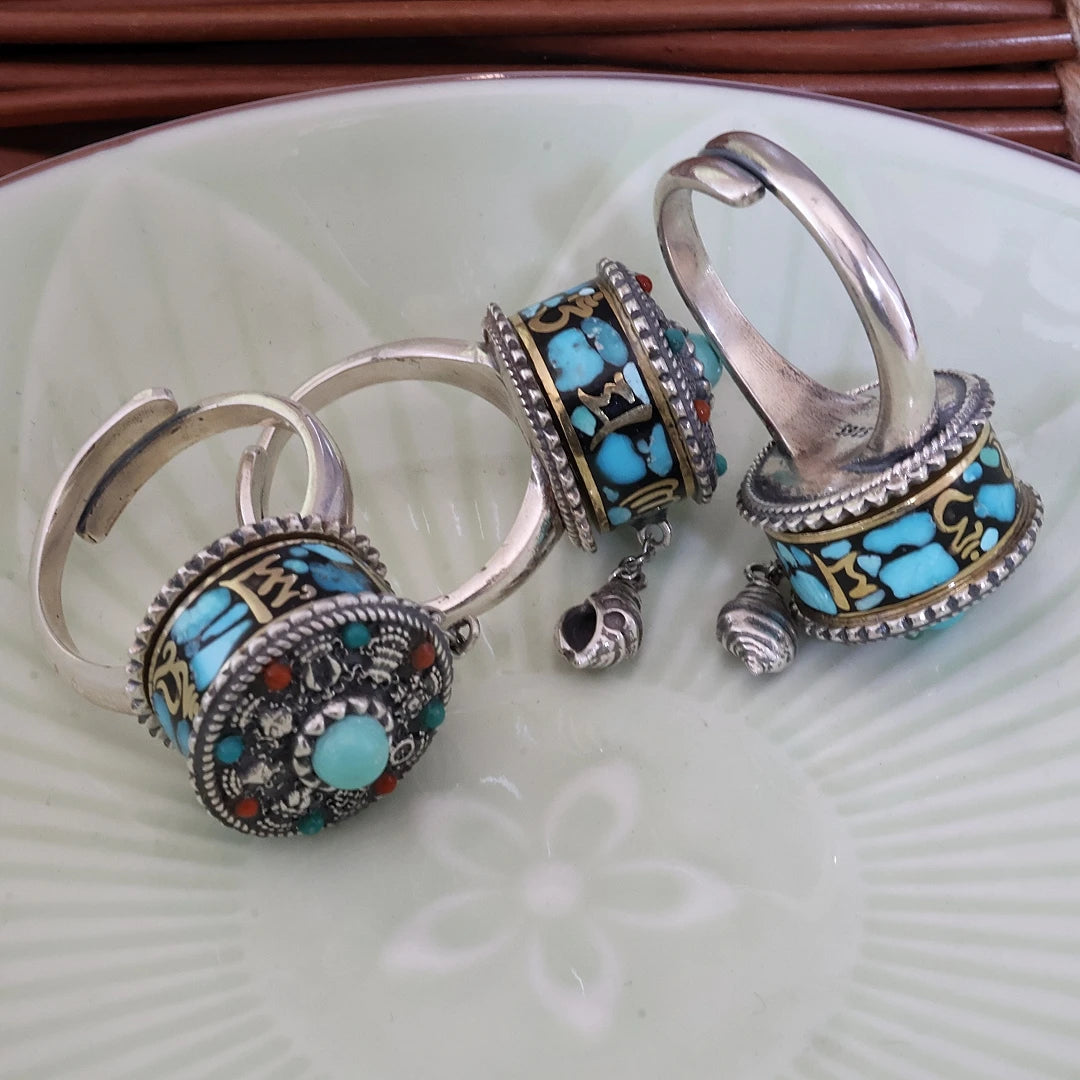Fine jewelry art Tibetan mantra ring in deep blue, handcrafted as a spiritual masterpiece for peace and wisdom.