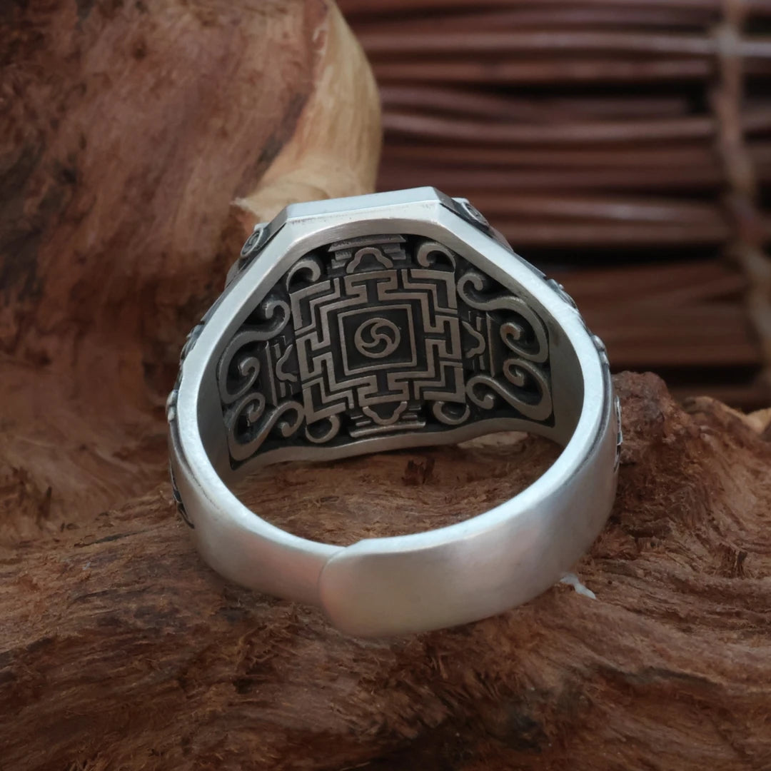 Fine jewelry art in an artisan Tibetan Mongoose Ring, a unique piece within the rich heritage of Tibetan Buddhist Jewelry Culture.