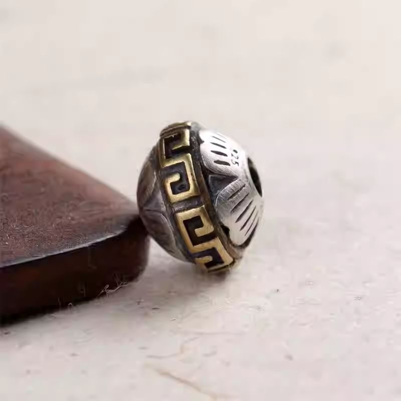  Handmade silver inlaid copper lotus saucer spacer bead, showcasing Tibetan Buddhist Jewelry Culture and jewelry art.