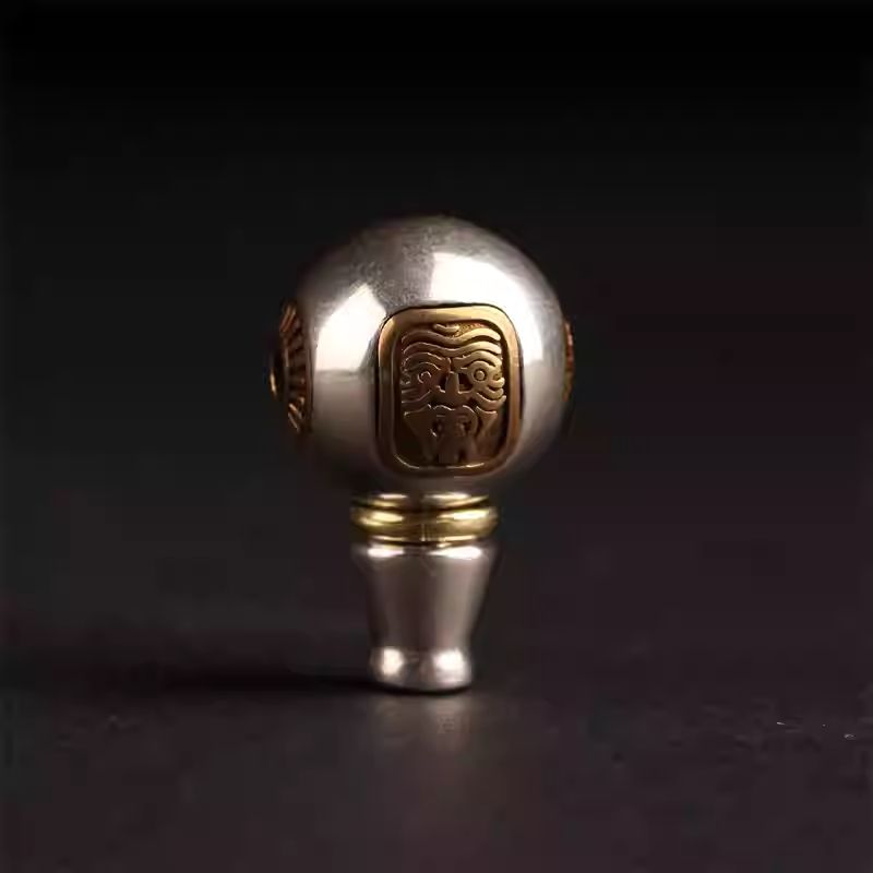 Exquisite silver Tibetan protector mala beads, functional jewelry art for luck and guidance, rooted in Tibetan Buddhist Jewelry Culture.
