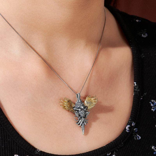 Handcrafted 3D Garuda pendant with silver and copper inlay, Tibetan Buddhist Jewelry Art combining protection, courage, and ethnic craftsmanship.