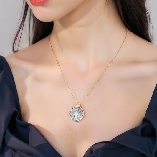 Handcrafted Guanyin pendant in silver with black pearl and CZ, Tibetan Buddhist Jewelry Art combining protection and blessings.
