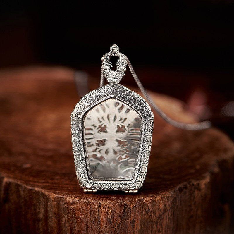 Handcrafted openable pagoda Zodiac Buddha pendant in white crystal and silver, Tibetan Buddhist Jewelry Art combining spiritual meaning and ethnic craftsmanship.