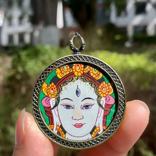 Tibetan-style pendant of White Tara Thangka in Gau box, a sacred Tibetan Buddhist jewelry art piece symbolizing compassion, protection, and peace.
