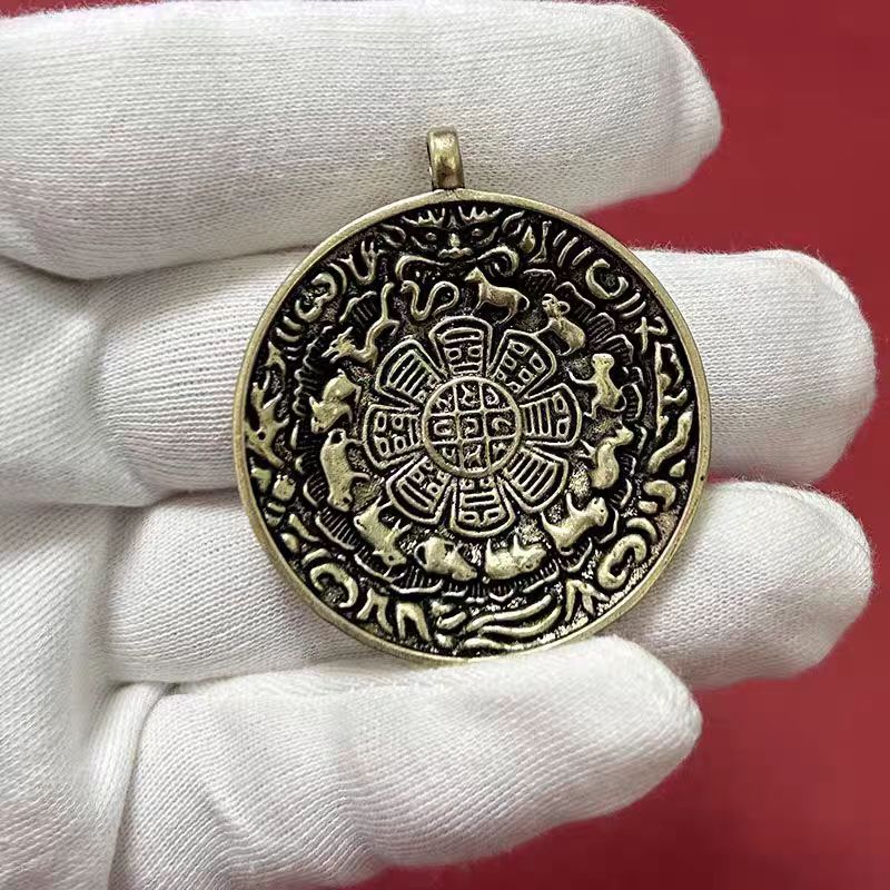 Handmade Nine Palace Bagua brass pendant, inspired by Tibetan Buddhist Jewelry Culture, combining cultural heritage with jewelry art craftsmanship.
