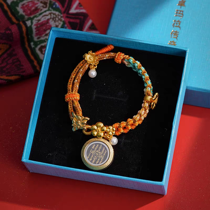 Traditional hand-knotted natural agate bracelet with a micro-painted Thangka script, embodying Tibetan Buddhist Jewelry Culture jewelry art.