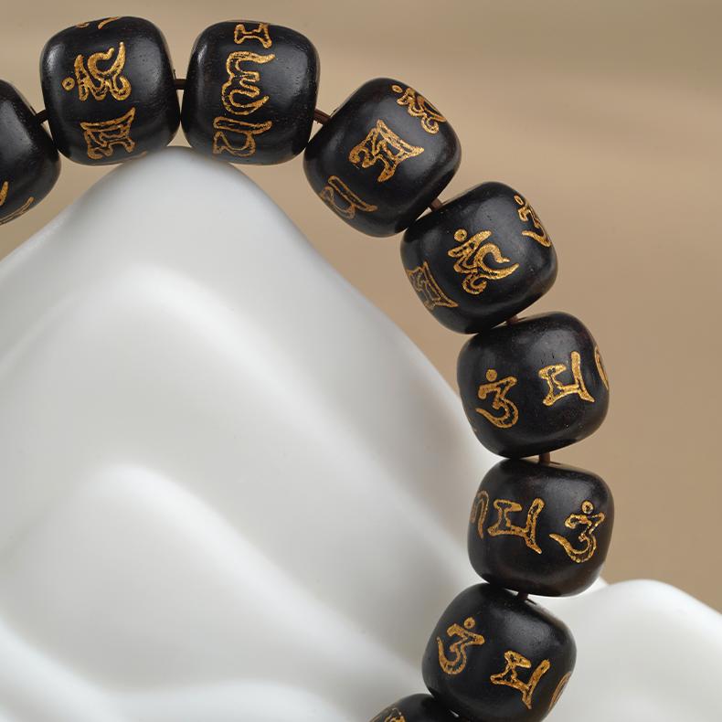 The perfect presentation of cultural art in ebony and red sand spiritual jewelry, expressing rich Buddhist philosophy.