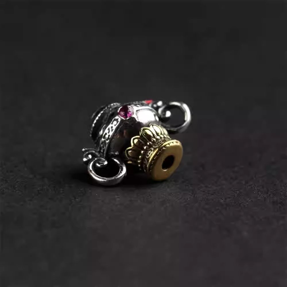 Handcrafted jewelry art accessory featuring sacred Bodhi seeds and Vajra motifs, representing enlightenment and protection.