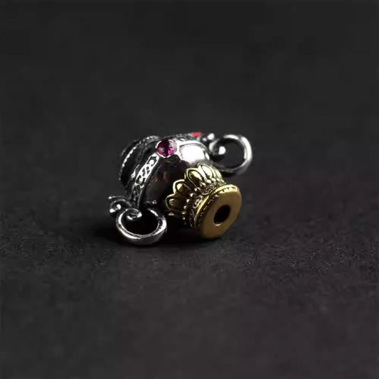 Handcrafted jewelry art accessory featuring sacred Bodhi seeds and Vajra motifs, representing enlightenment and protection.