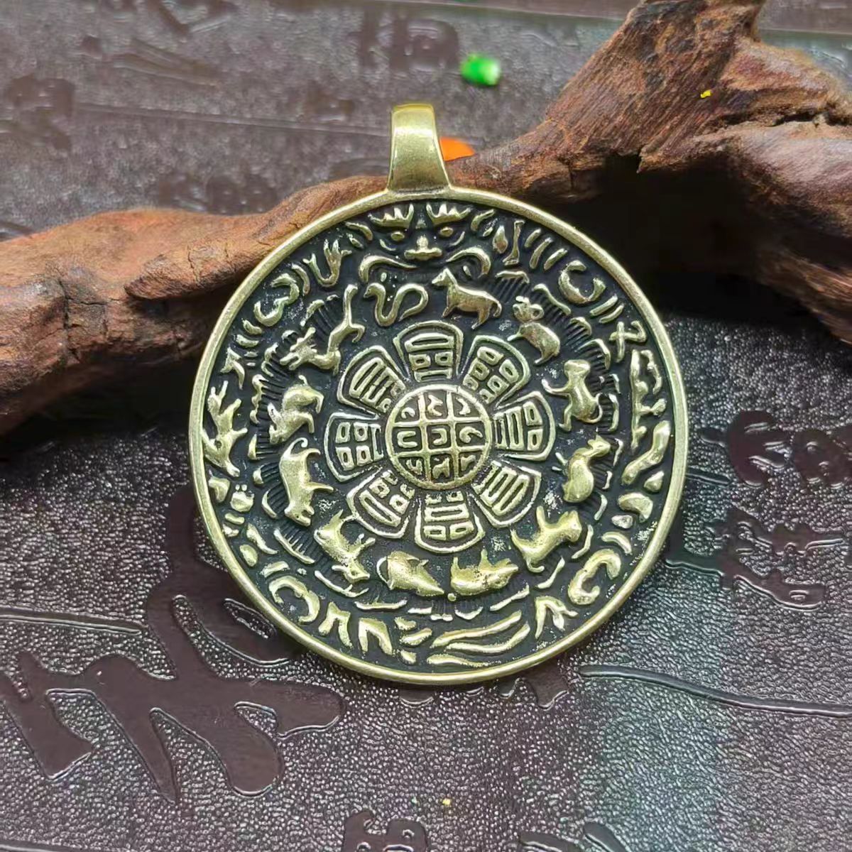 Vintage ethnic brass Bagua pendant, handcrafted in Tibetan Buddhist style, a jewelry art piece designed for luck, prosperity, and protection.