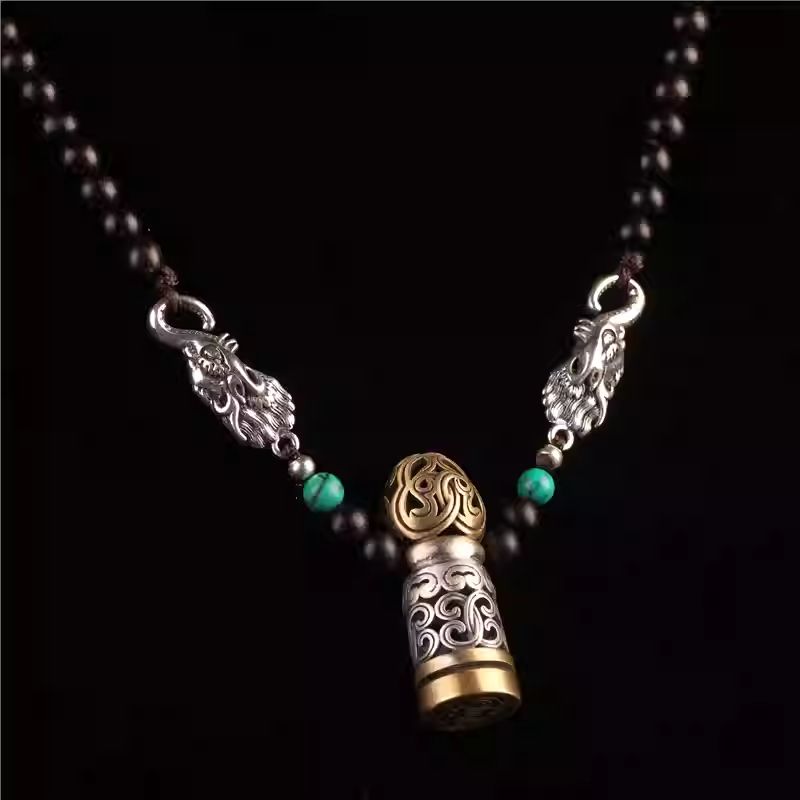 Artisan-crafted Makara seal pendant for women, showcasing the spiritual beauty of Tibetan Buddhist Jewelry Culture and Jewelry art.