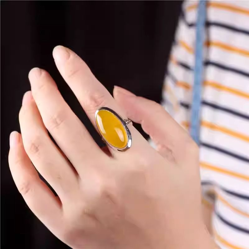 Artisan-crafted Yellow Agate silver ring, combining Tibetan Buddhist Jewelry Culture energy with bold Jewelry art.
