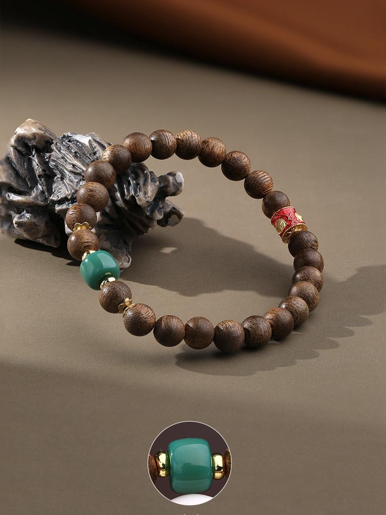 Snow Capped Mountain agarwood design in Tibetan Buddhist jewelry art, featuring sacred geometry and spiritual mountain symbolism.