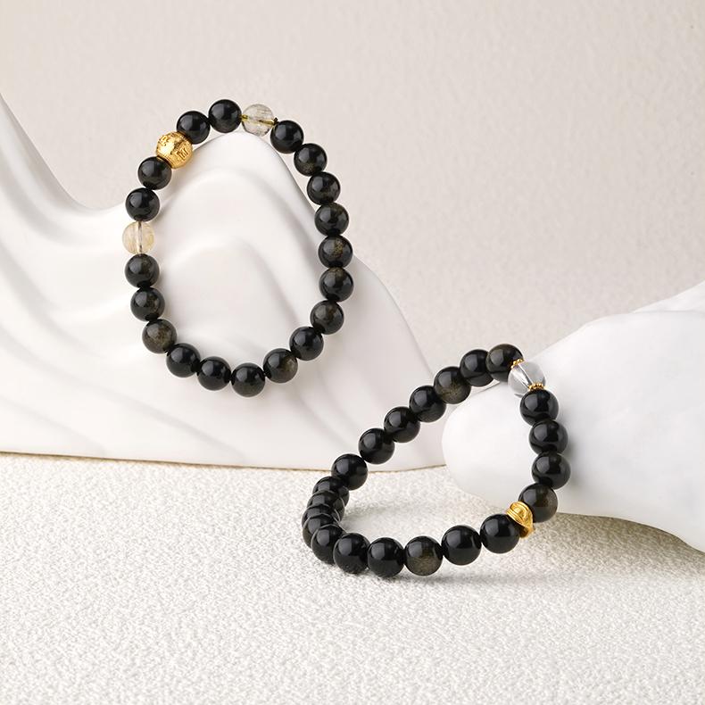 Sacred Geometry Obsidian and crystal balance bracelet in Tibetan Buddhist jewelry art style.