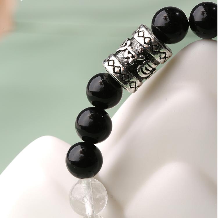 Detail of Pure Handmade Obsidian Crystal Mala. Shows artisan hand-stringing process, each gemstone carefully selected and polished to ensure energy flow, perfect for meditation and mantra recitation.