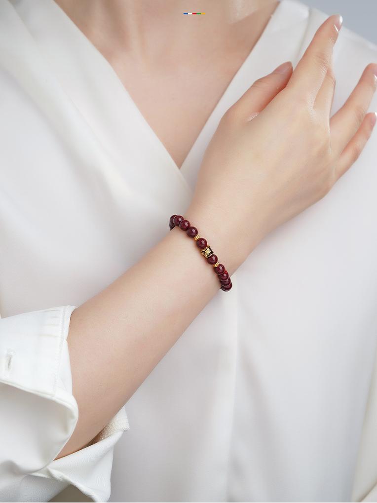 Cinnabar Auspicious bracelet with quartzite jade, representing good fortune in Tibetan Buddhist jewelry culture