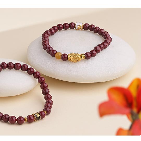 Sacred cinnabar mala with blessing energy, featuring traditional Tibetan Buddhist jewelry art symbolism