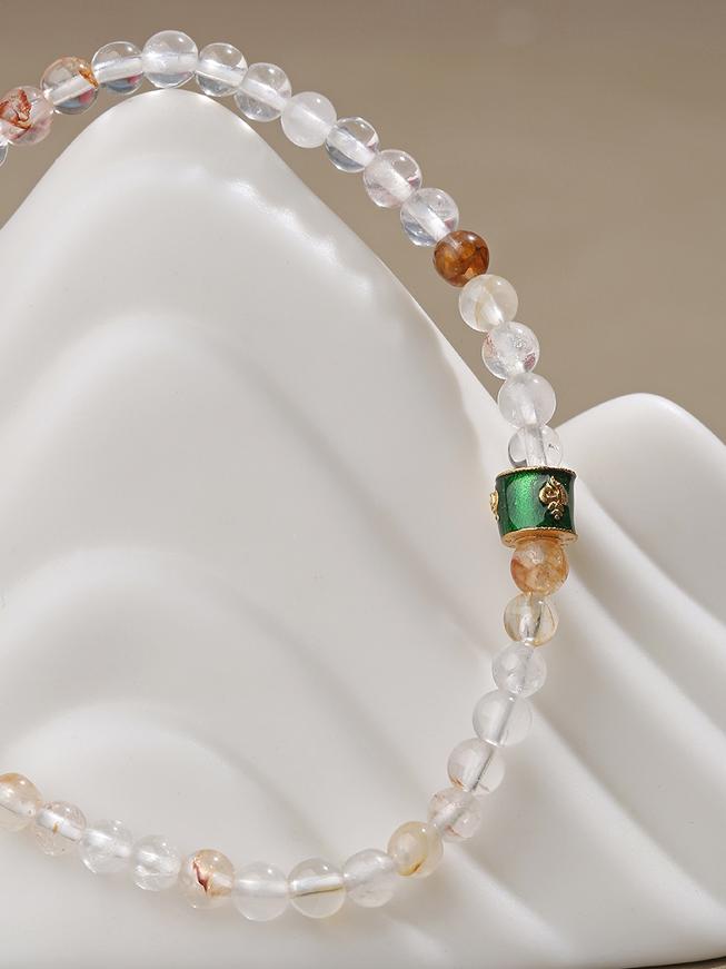 Mala-style crystal copper bracelet with hand-painted details, representing authentic Tibetan Buddhist jewelry art craftsmanship.