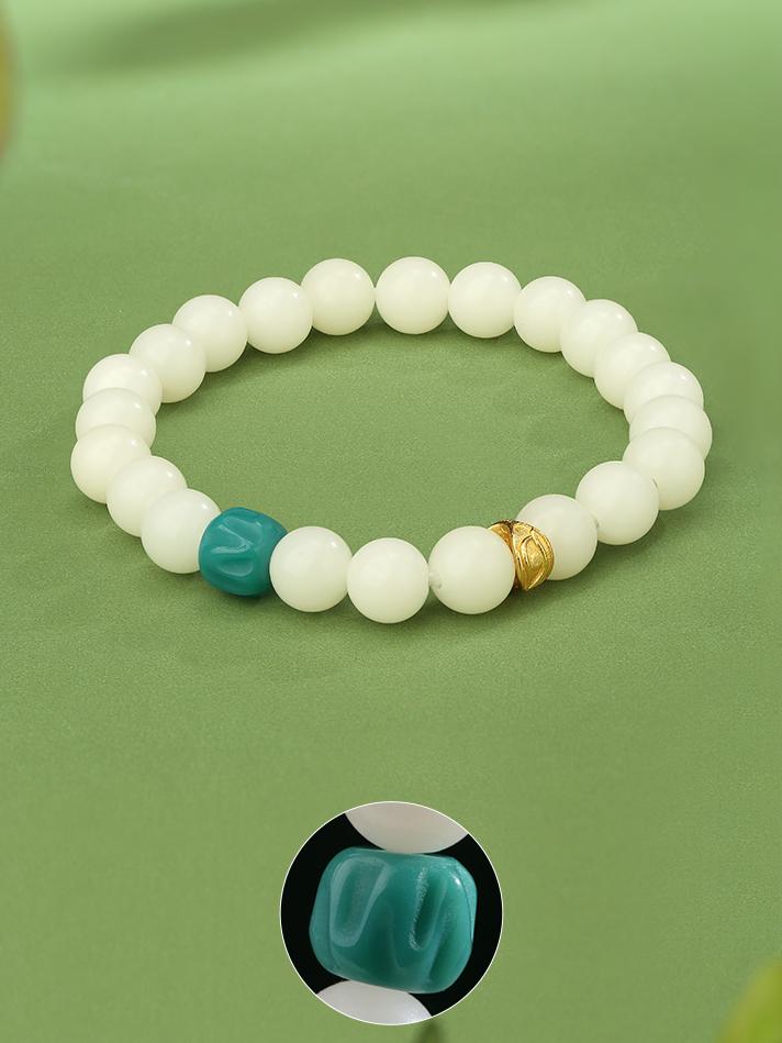  Hand-painted Bodhi Wisdom Drop bracelet embodying Tibetan Buddhist jewelry art tradition for spiritual enlightenment and clear insight.