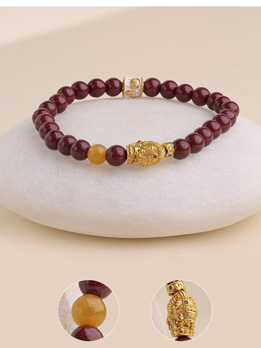 Hand-painted cinnabar and quartzite jade love bracelet in Tibetan Buddhist jewelry culture, promoting affectionate energy