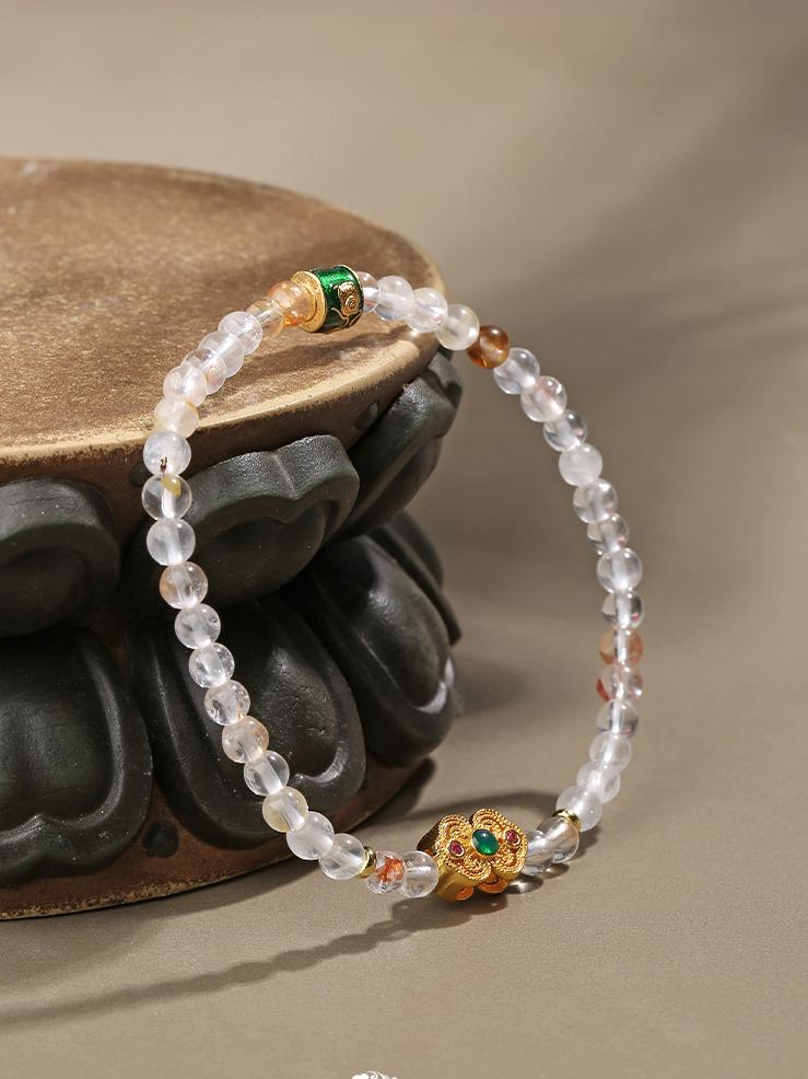Artisanal copper components with hand-painted crystals in Tibetan Buddhist jewelry culture, creating powerful energy cleansing and balancing properties.
