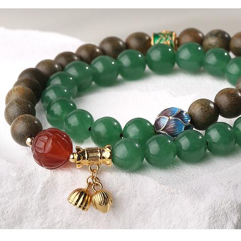 Green Sandalwood Agate healing bracelet promoting physical and spiritual harmony through Tibetan Buddhist jewelry art.