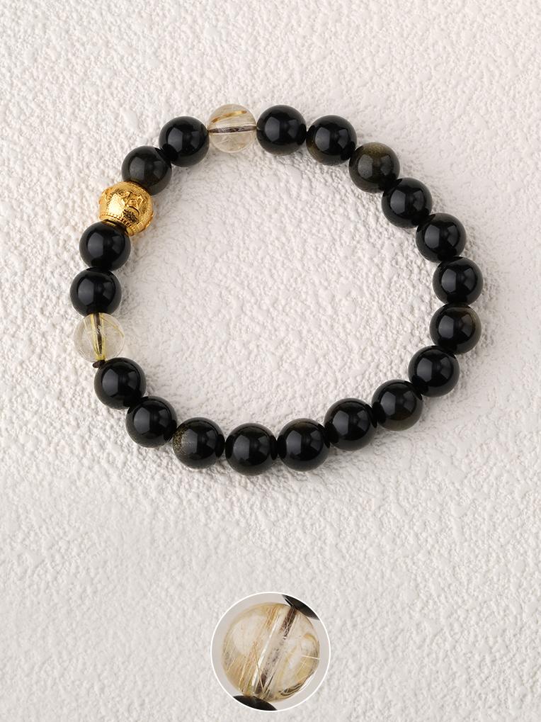 Hand-painted Obsidian and crystal grounding bracelet, showcasing Tibetan Buddhist jewelry art for inner stability.