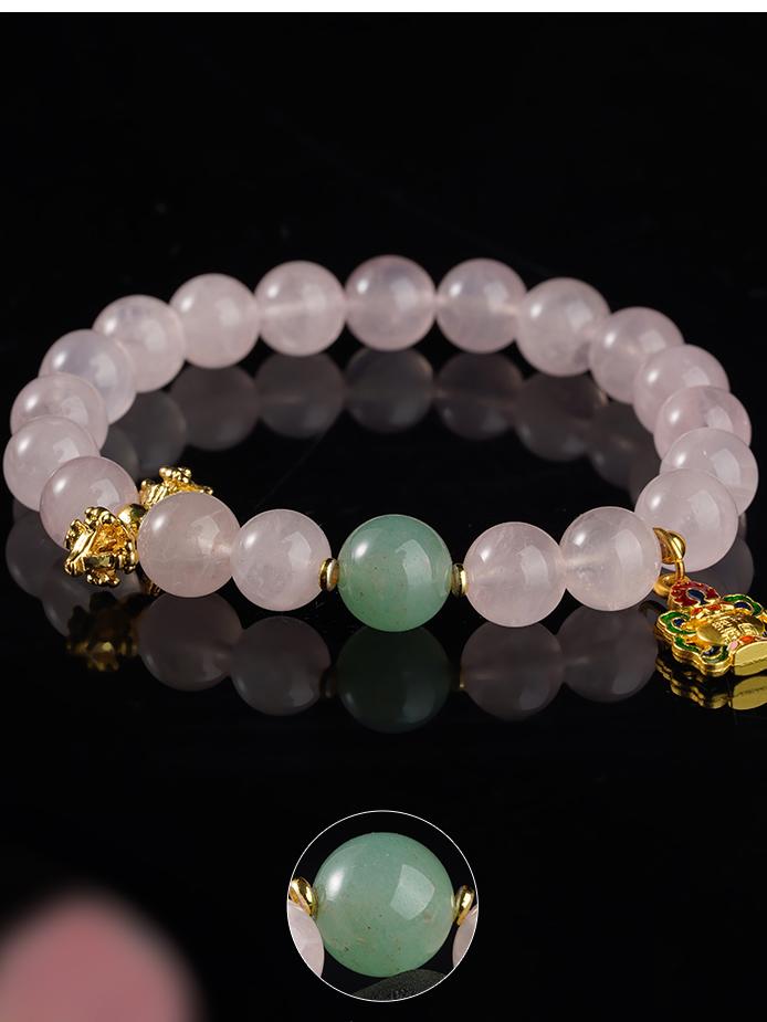 Hand-painted pink quartz love energy bracelet in Tibetan Buddhist jewelry culture, promoting affectionate connections and emotional healing