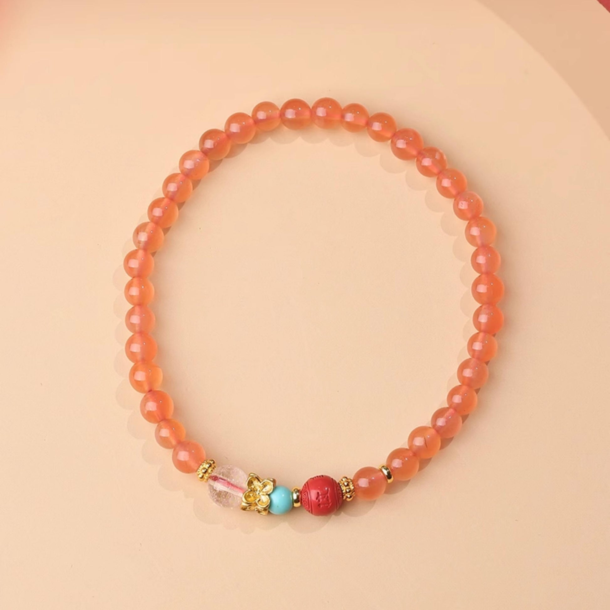 Close-up of Sacred Red Queens Jasper Protection Bracelet. Deep red hue symbolizes life energy and auspicious protection, regarded as powerful guardian stone in Tibetan Buddhist culture, ideal for daily wear against negative energy.