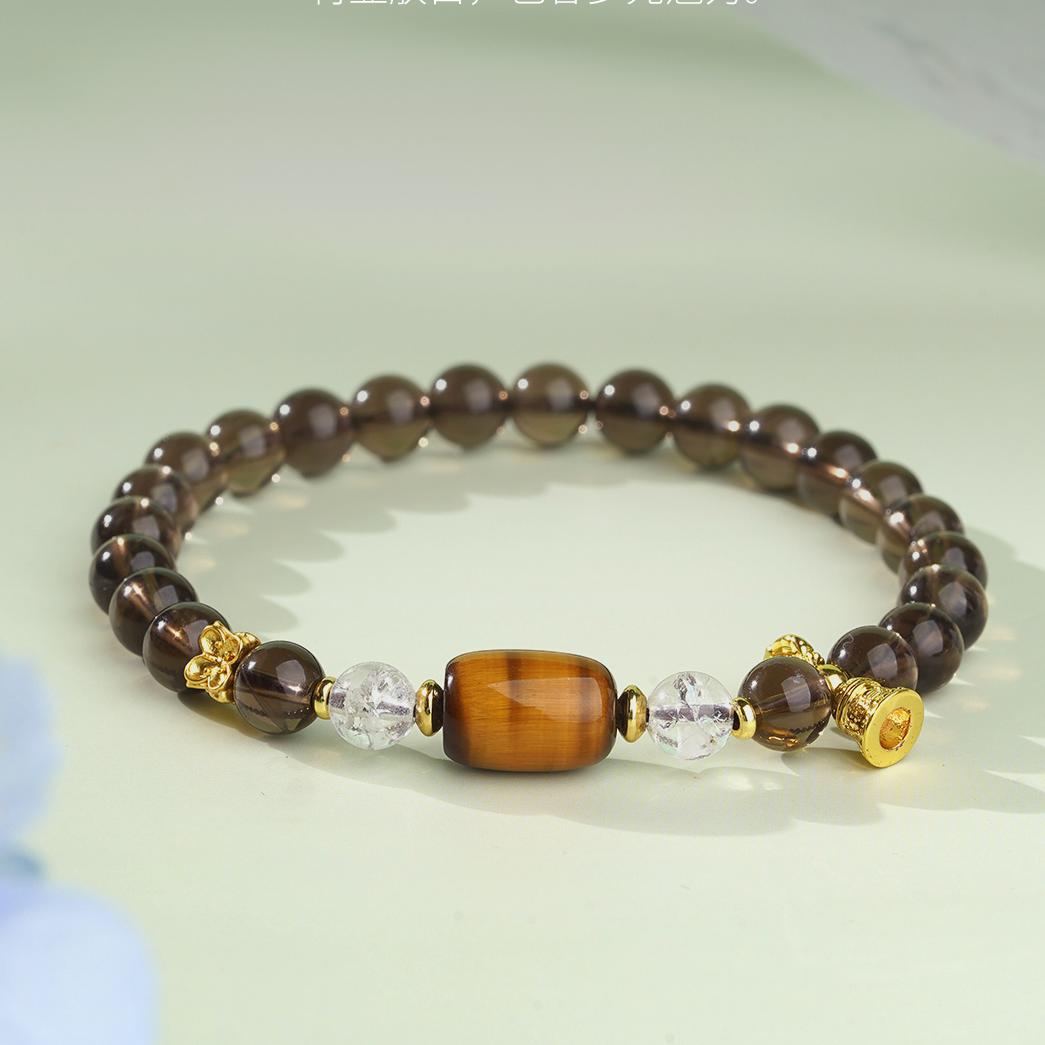 Meditation Tiger's Eye bracelet for focus and intention setting, combining Tibetan Buddhist jewelry traditions with contemporary jewelry art.