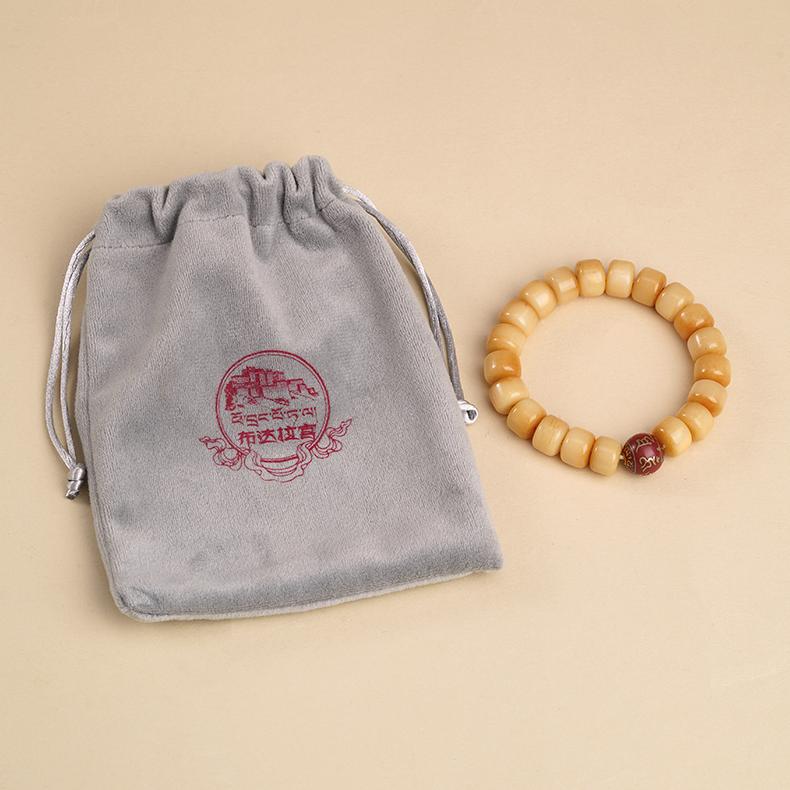 Hand-painted incense ash beads meditation aid in Tibetan Buddhist jewelry art, crafted with ritual materials for spiritual practice.