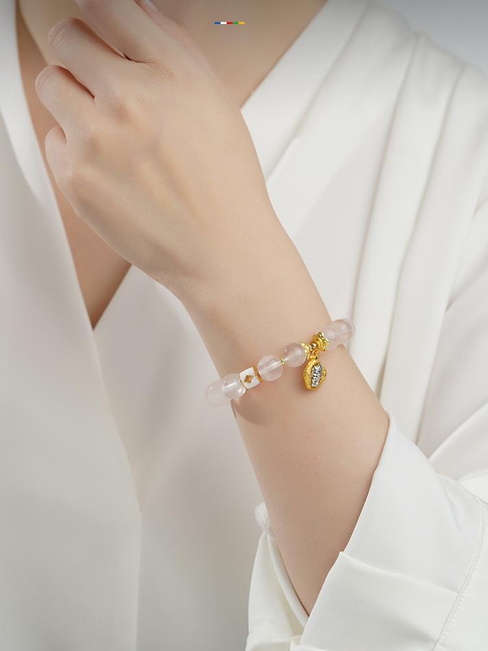 Pink Quartz harmony bracelet with gentle energy, representing Tibetan Buddhist jewelry culture for emotional healing