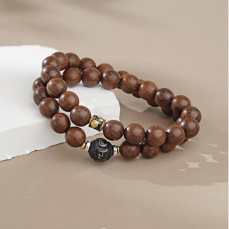 Full view of the Eternal Ease Golden Sandalwood Multi-Strand Bracelet. Multiple strands of golden sandalwood beads with clear, flowing wood grain, showcasing the rustic and free-spirited essence of Tibetan Buddhist jewelry.