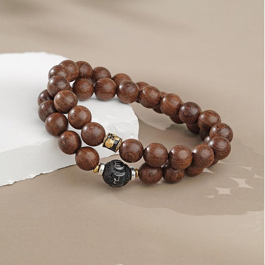 Full view of the Eternal Ease Golden Sandalwood Multi-Strand Bracelet. Multiple strands of golden sandalwood beads with clear, flowing wood grain, showcasing the rustic and free-spirited essence of Tibetan Buddhist jewelry.