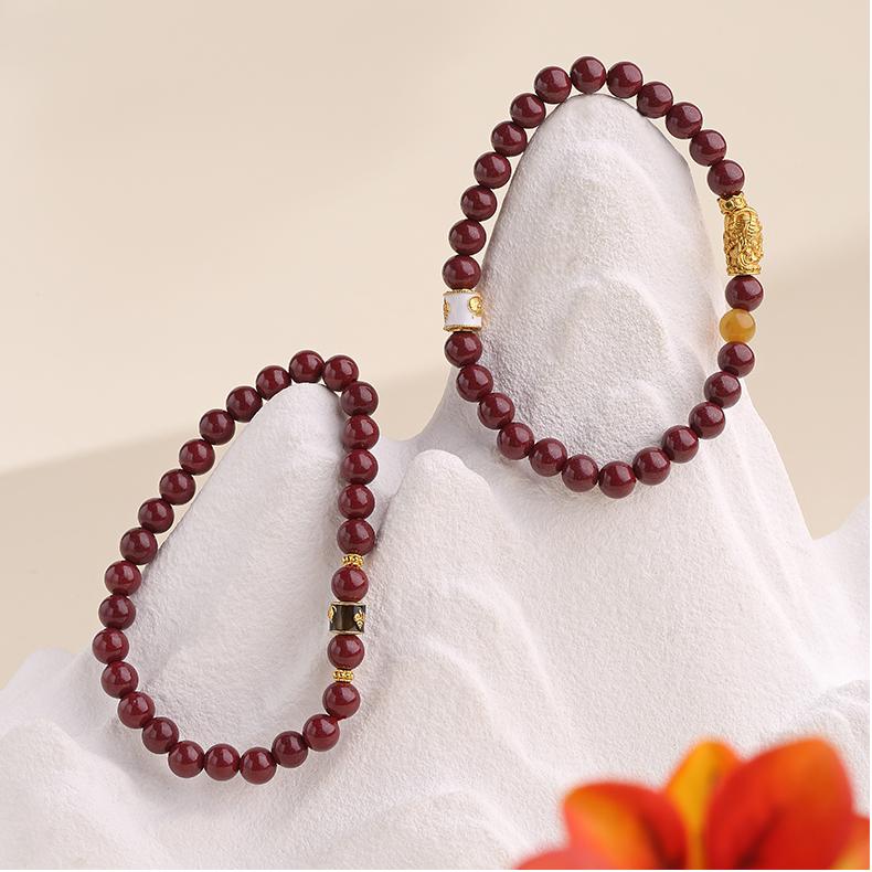 Artisanal cinnabar beads with quartzite jade, showcasing traditional Tibetan Buddhist jewelry art craftsmanship