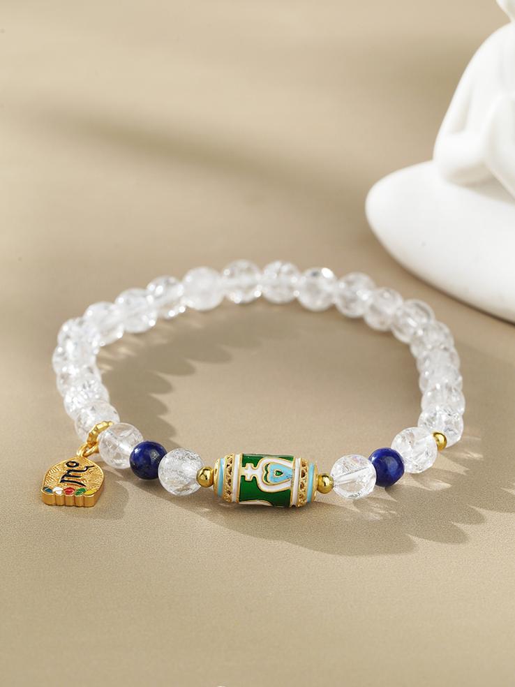 Healing Crystal and Lapis Balance Bracelet wearing style. Clear crystal balances emotions, deep lapis lazuli awakens wisdom, wearing on wrist brings physical, mental and spiritual harmony and balance.
