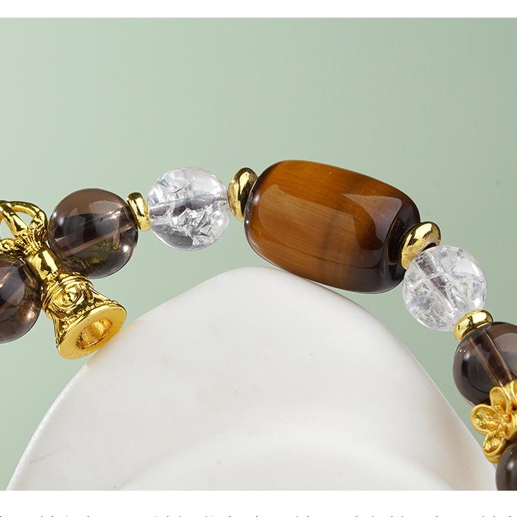 Tibetan Buddhist Tiger's Eye stone mala bracelet for grounding energy meditation, representing spiritual jewelry art with earthy tones.