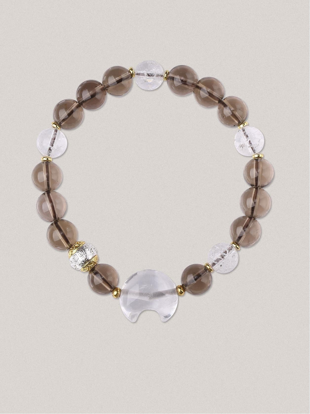 Sacred Smoky and Clear Crystal design in Tibetan Buddhist jewelry art, promoting energetic balance and spiritual harmony.