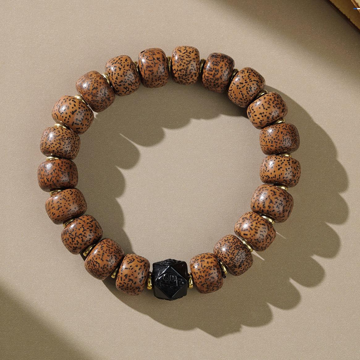 Sacred Bodhi Obsidian mala in Tibetan Buddhist jewelry art, perfect for meditation practice and spiritual protection.