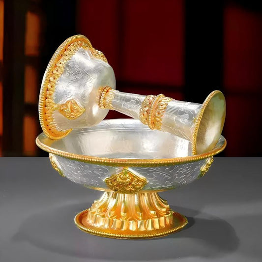 Tibetan Buddhist sacrificial implements culture: Detailed view of a gilded silver ritual chalice from Nepal, representing the highest standards of Buddhist sacrificial items art.