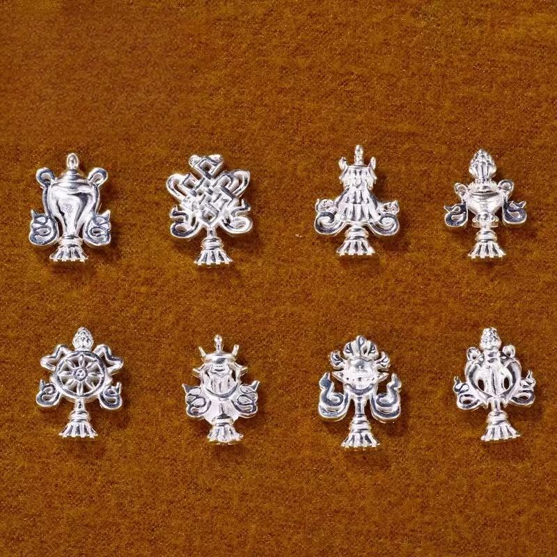 Authentic Tibetan Buddhist sacrificial implements culture ornament, meticulously handcrafted from 925 pure silver featuring the Eight Auspicious Symbols for spiritual home altar protection.