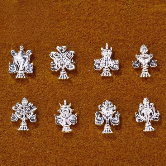 Authentic Tibetan Buddhist sacrificial implements culture ornament, meticulously handcrafted from 925 pure silver featuring the Eight Auspicious Symbols for spiritual home altar protection.