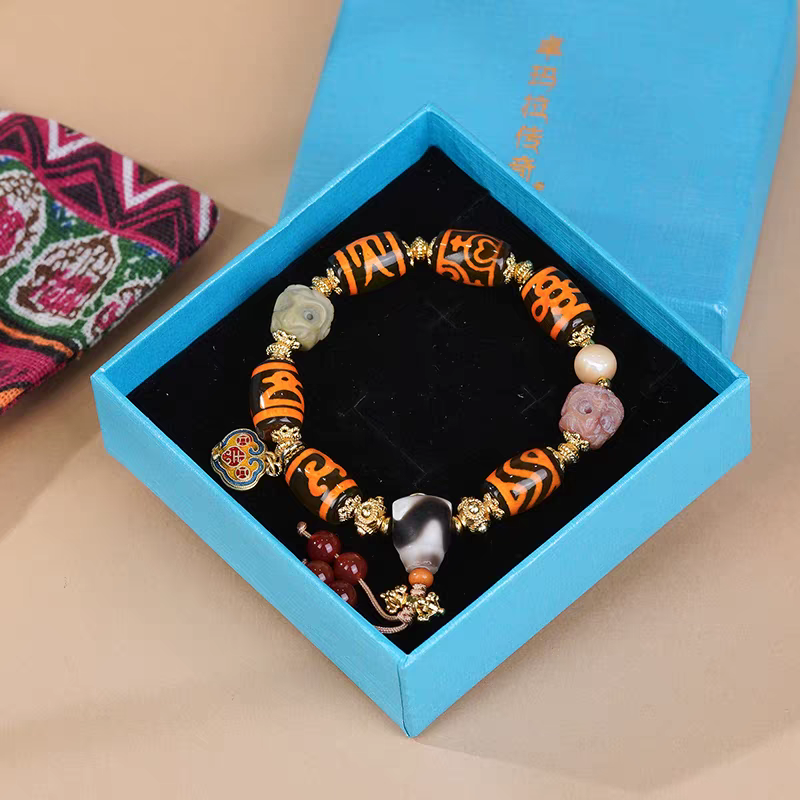 Authentic barley-shaped Dzi bead bracelet, a masterpiece of Buddhist sacrificial items art within the Tibetan Buddhist sacrificial implements culture. Purely handmade.