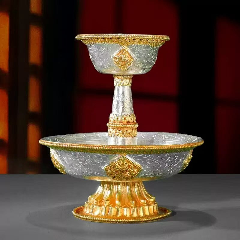 Buddhist sacrificial items art: A handmade two-tone gold and silver protector deity cup, designed for daily sacred tea or wine offerings in traditional Himalayan rituals. 